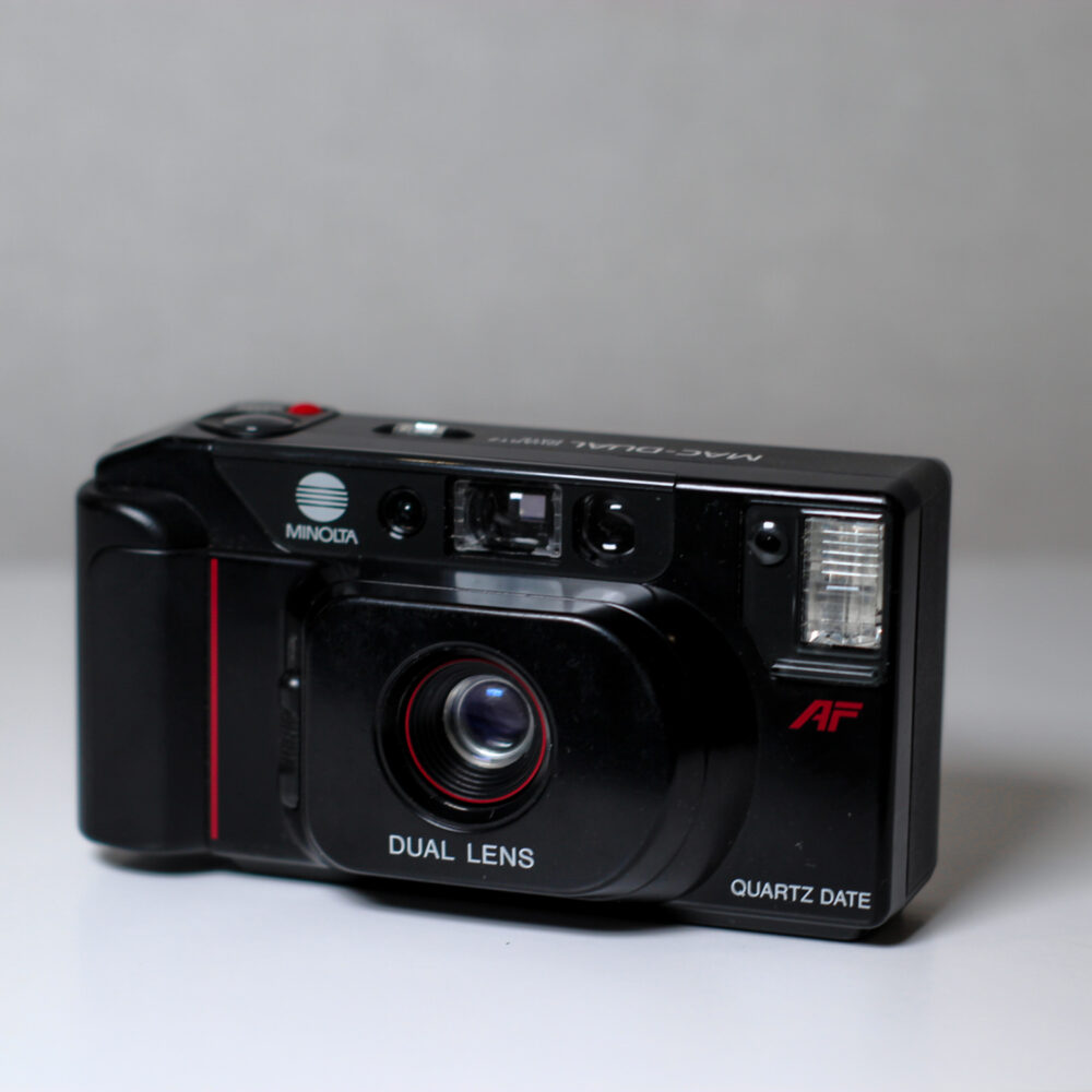 Плівковий фотоапарат Minolta MAC-DUAL Quartz Date Point & Shoot AF Dual Lens Black I 7633 f/3.5 або f/5.6 зі спалахом